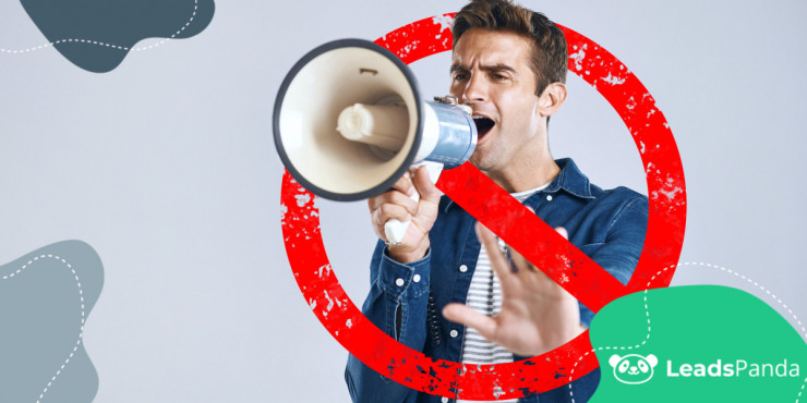 A young man in a denim jacket and striped shirt yells emphatically into a megaphone overlaid with a large red prohibition slash, symbolizing the irony of forced silence in a noisy world—against a light gray background, evoking the power of subtle marketing over overt promotion.
