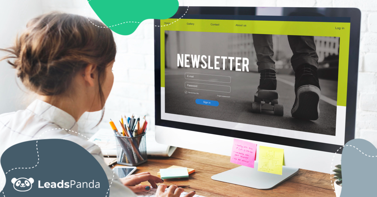 Person working on a desktop computer displaying an email newsletter sign-up page, representing email newsletter examples and design